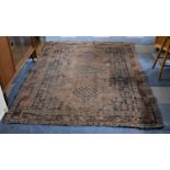 An Antique Persian Patterned Rug, Somewhat Worn and Faded, 194x144cm