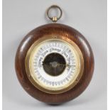 An Edwardian Circular Oak Aneroid Barometer, 13.5cm Diameter
