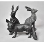 A Collection of Three Cast Resin Animal Ornaments, Two Seated Hares and Fox, 34cm high