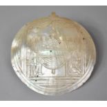 A Carved Mother of Pearl Shell Depicting the Last Supper, 15cm Wide