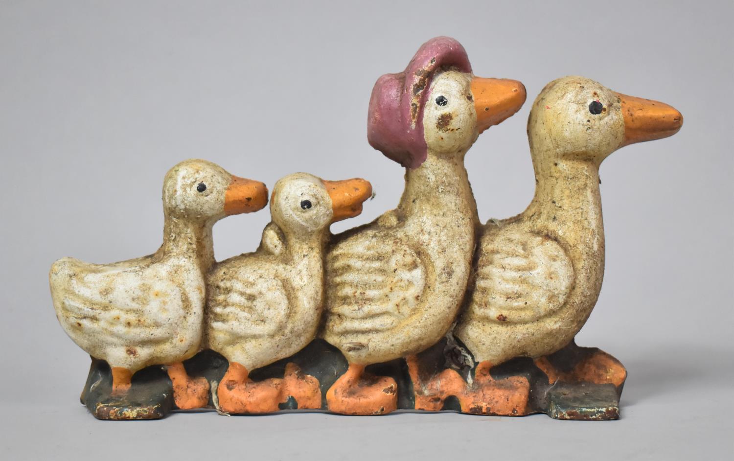 A Modern Painted Cast Iron Doorstop in the Form of Duck Family, 25cm Long