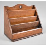 An Edwardian Oak Four Section Stationery Rack, 25.5cm Wide and 18.5cm high