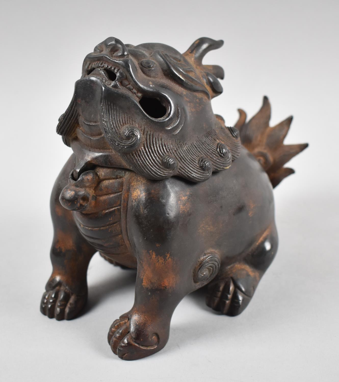 A Heavy Bronze Censer in the Form of a Temple Lion, with Hinged Lid, 16.5cm high