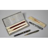 A Cased Vintage Parker Pen and Pencil Set the pen with 14 nib, Boxed Waterman Junior Pen with 14k
