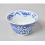 A Chinese Blue and White Tea Bowl Decorated with Floral Motif, Four Character Mark Surrounded by