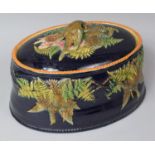 An English Majolica Oval Green Game Pie Dish C.1900, Decorated in Polychrome Glazed Relief Depicting