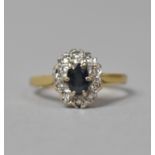 An 18ct Gold Ring Set with Sapphire and Diamonds, Size O, 3.9gms