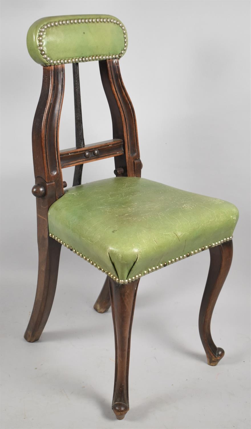 An Unusual 19th Century Leather Upholstered Chair with Winding Adjustment to back, Perhaps for