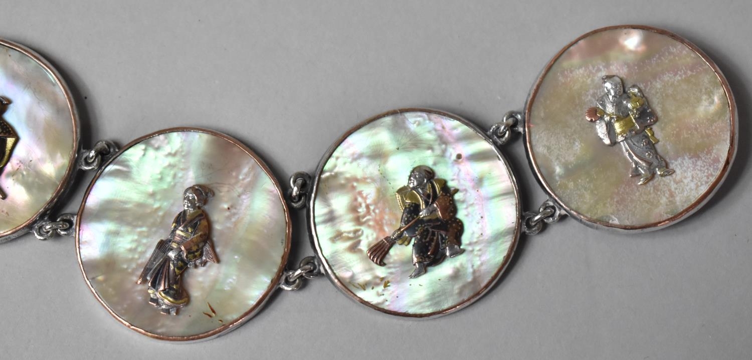 A Chinese Silver on Copper and Mother of Pearl Sectional Necklace. The Eleven Circular Mounted - Image 6 of 7