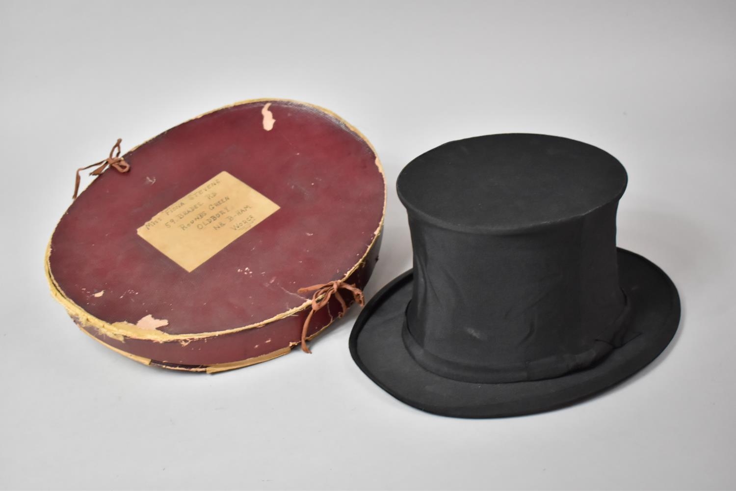 A Vintage Collapsible Opera Top Hat by Henry Heath with Addressed Oval Cardboard Container