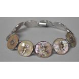 A Chinese Silver on Copper and Mother of Pearl Sectional Necklace. The Eleven Circular Mounted