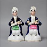 A Pair of 19th Century Staffordshire Pottery Figures of Seated Musicians, 11cm high
