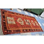 A Good Quality Handmade Patterned Caucasian Runner on Red Ground, 254x127cm