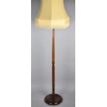 A Mid 20th Century Turned Wooden Standard Lamp and Shade
