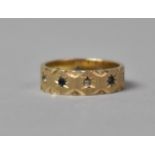 A 9ct Gold, Blue and White Sapphire Mounted Eternity Type Ring, Machine Etching and Diamond Cut