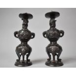 A Pair of 19th Century Bronze Altar Prickets of Globular Sectional Form Decorated in Relief with