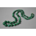 A Hand Cut and Polished Malachite Necklace, with Yellow Metal Clasp, Hand Knotted String, 80cms Long
