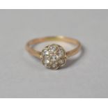 A Rose Gold and White Sapphire Late 19th/Early 20th Century Ladies Daisy Ring. (Hallmark