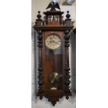 An Edwardian Walnut and Mahogany Vienna Style Wall Clock by Gustav Becker having Half Pilaster