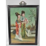 An Early 20th Century Oriental Reverse Glass Painting of Two Ladies in Traditional Costume, in an