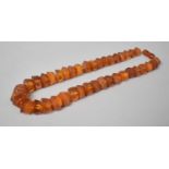 A Vintage Graduated Baltic Amber Bead Necklace of Hexagonal Form, 40cms Long