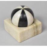 A Continental Desk Weight Formed from a Specimen Marble Sphere Mounted in a Marble Plinth, 12cm x
