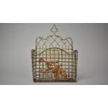 An Arts and Crafts Brass Wire Wall Hanging Letter Basket with Floral Copper Mount.