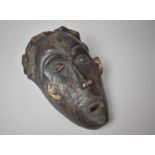 A Vintage African Wooden Tribal Mask, 27cms High