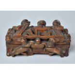 A Victorian Treen Rectangular Carved 'Blind Man' Table Snuff Decorated in Relief with Scenes From
