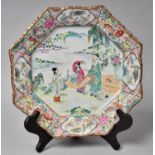A 19th Century Chinese Famille Rose Charger of Octagonal For with Applied Enamels Depicting Exterior
