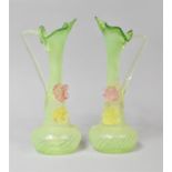 A Pair of Hand Blown Green Glass Ornamental Jugs with Floral Mounts. 22cms High