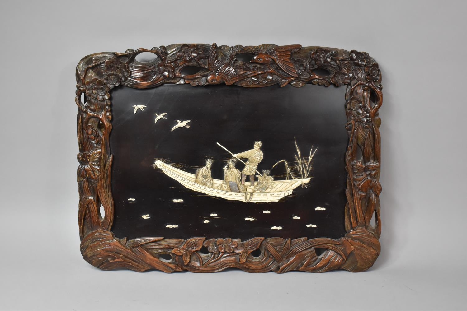 A Late 19th Century Japanese Shibayama Wall Plaque, Decorated with Four Figures in a Boat