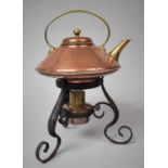 A Christopher Dresser Influenced Copper Spirit Kettle on Wrought Iron Stand with Original Burner, By