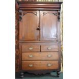 A 19th Century Mahogany Housekeepers Cupboard. The Base with Two Short Drawers and Two Long Drawers,