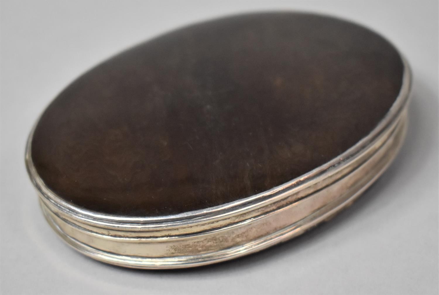 An 18th Century Tortoiseshell and Un-Marked Silver Oval Snuff