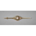 A Late 19th/Early 20th Century Gold Bar Brooch with Twelve Diamond Chips and Centre Pearl, 8cms