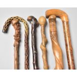 A Group of Six Country Made Early 20th Century Walking Sticks and Canes, Some with Natural Twisted