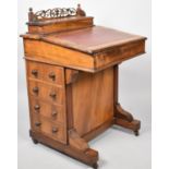 A Late Victorian/Edwardian Walnut Davenport having Tooled Leather Writing Surface to Hinged Lid