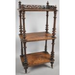 A Victorian Inlaid Walnut Three Tier Galleried Rectangular Whatnot with Turned Supports and