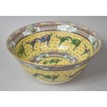 A Large Republic c.1930 Chinese Famille Jeaune Bowl, Decorated with Green and Blue Dragons Amongst