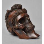 A Late 19th Century Japanese Carved Wood Okimono, Modelled as a Human Skull with Entwined Snake, 8cm