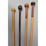 A Group of Four Early 20th Century Walking Canes with Turned Specimen Wood Handles, The Longest 92cm