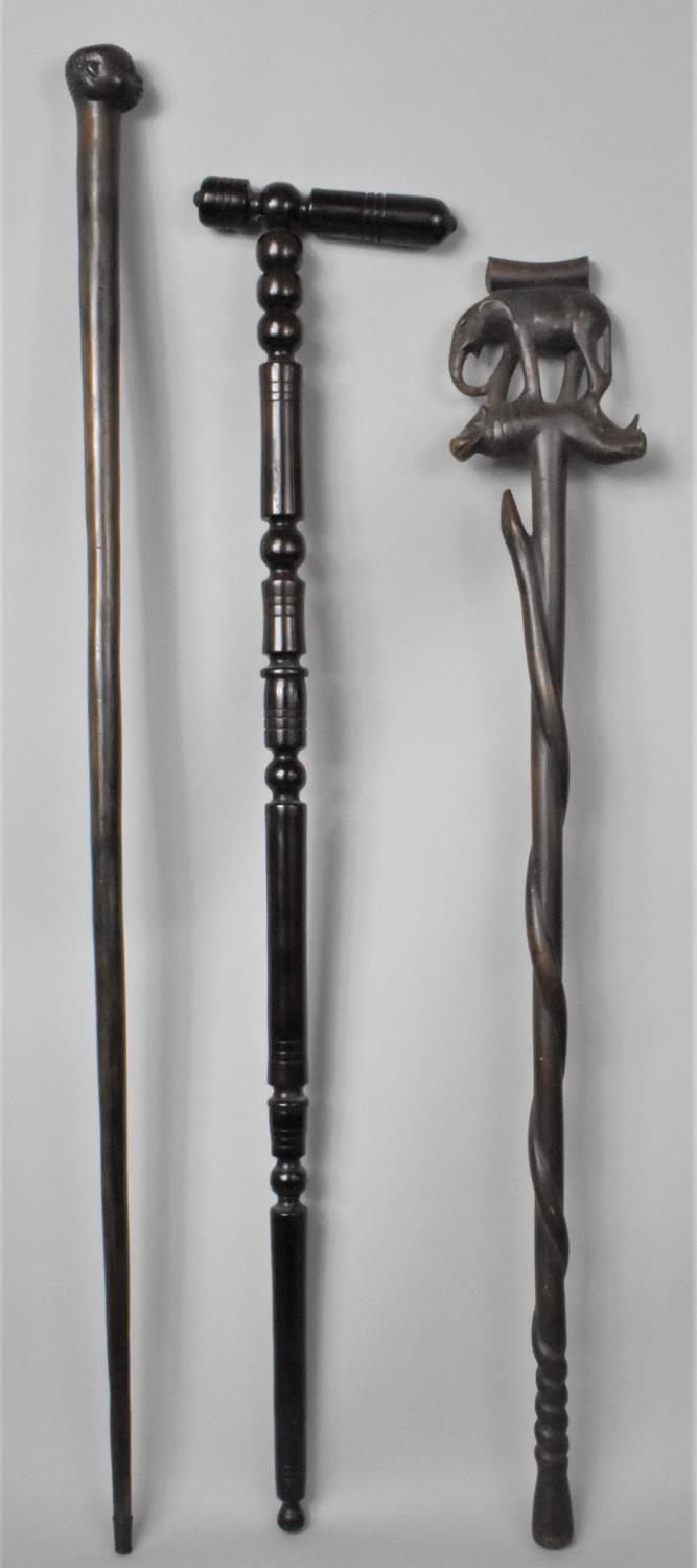 A Group of Three 19th Century African Carved Hardwood Walking Sticks, the Longest 91cm