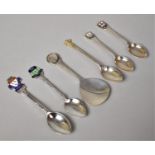 A Collection of Four Enamelled Souvenir Spoons, One Silver Coin Mounted Tea Caddy Spoon and a Silver