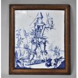 A Large and Interesting French Blue and White Tile in Wooden Frame Depicting a Figure Made up of