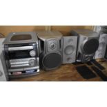 A Collection of Audio Equipment to Include Aiwa NSX-5222, Sharp CD Player