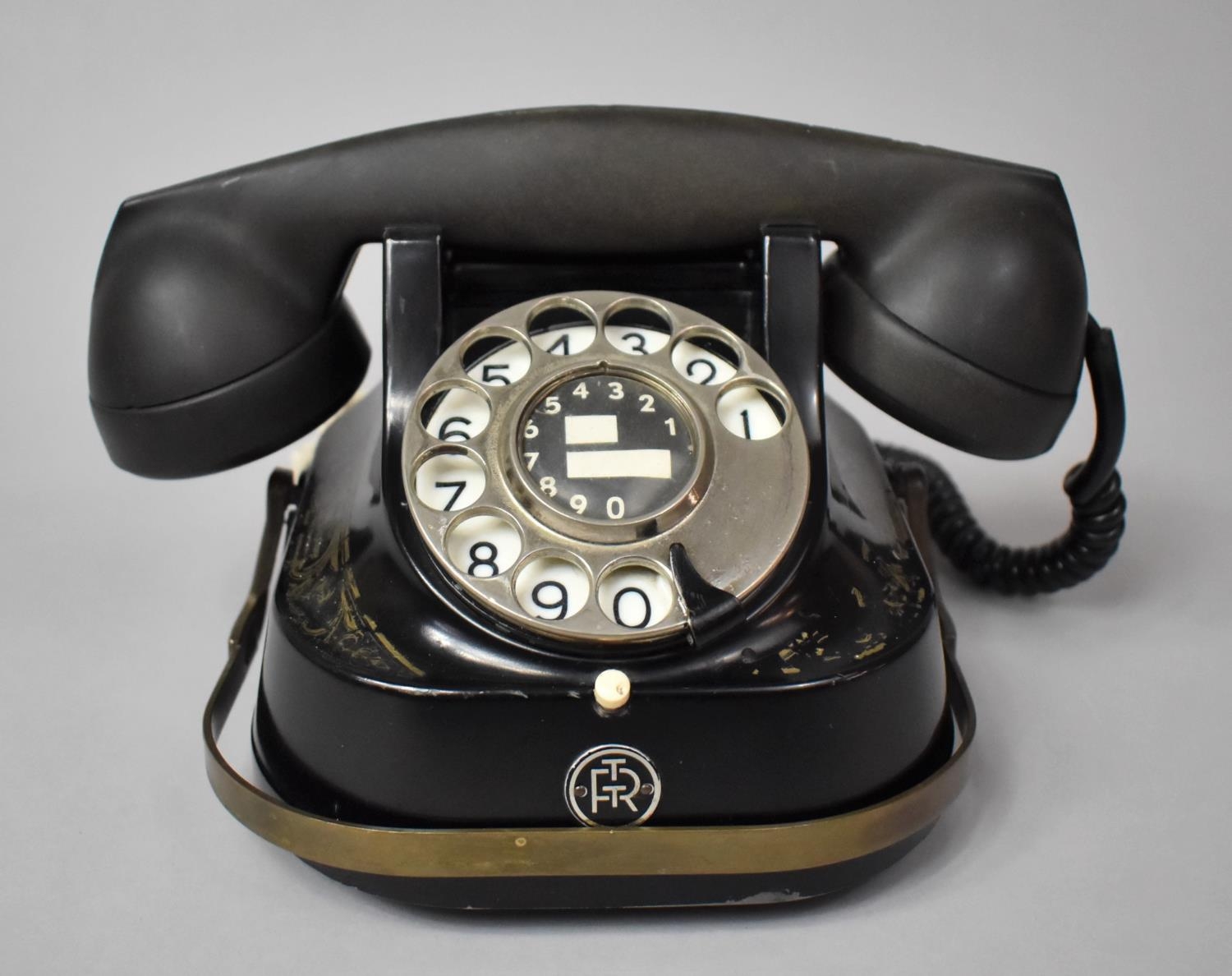 A Belgian Telephone by Bell Telephone Company with Brass Loop Carrying Handle.