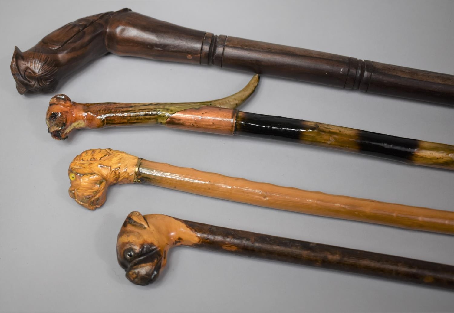 A Group of Four 20th Century Walking Sticks and Canes with Carved Animal Head Handles, The Longest - Image 2 of 7