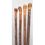 A Group of Four 19th Century Chinese Bamboo Walking Canes with Carved Decoration, The Longest 92cm