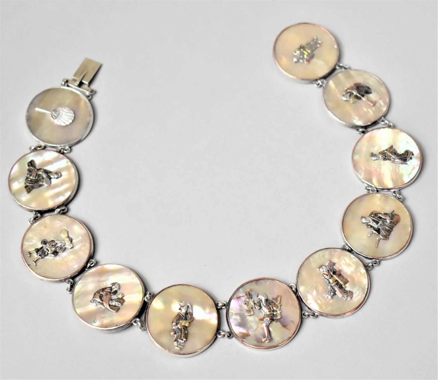 A Chinese Silver on Copper and Mother of Pearl Sectional Necklace. The Eleven Circular Mounted - Image 2 of 7